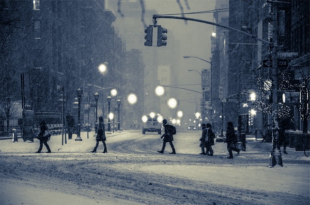 City streets. Snowing. 