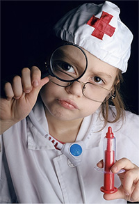 Child playing doctor.